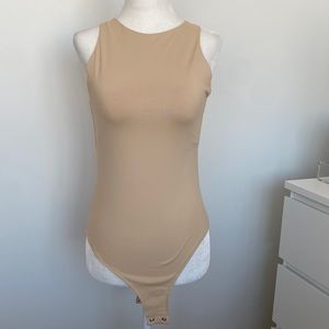 NWOT ReoRia Nude Bodysuit Medium - tags have been removed, never worn!